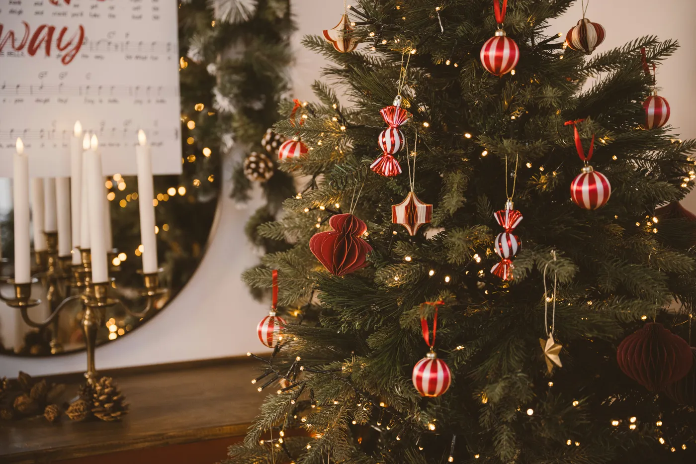 A decorated christmas tree with warm lights and ornaments