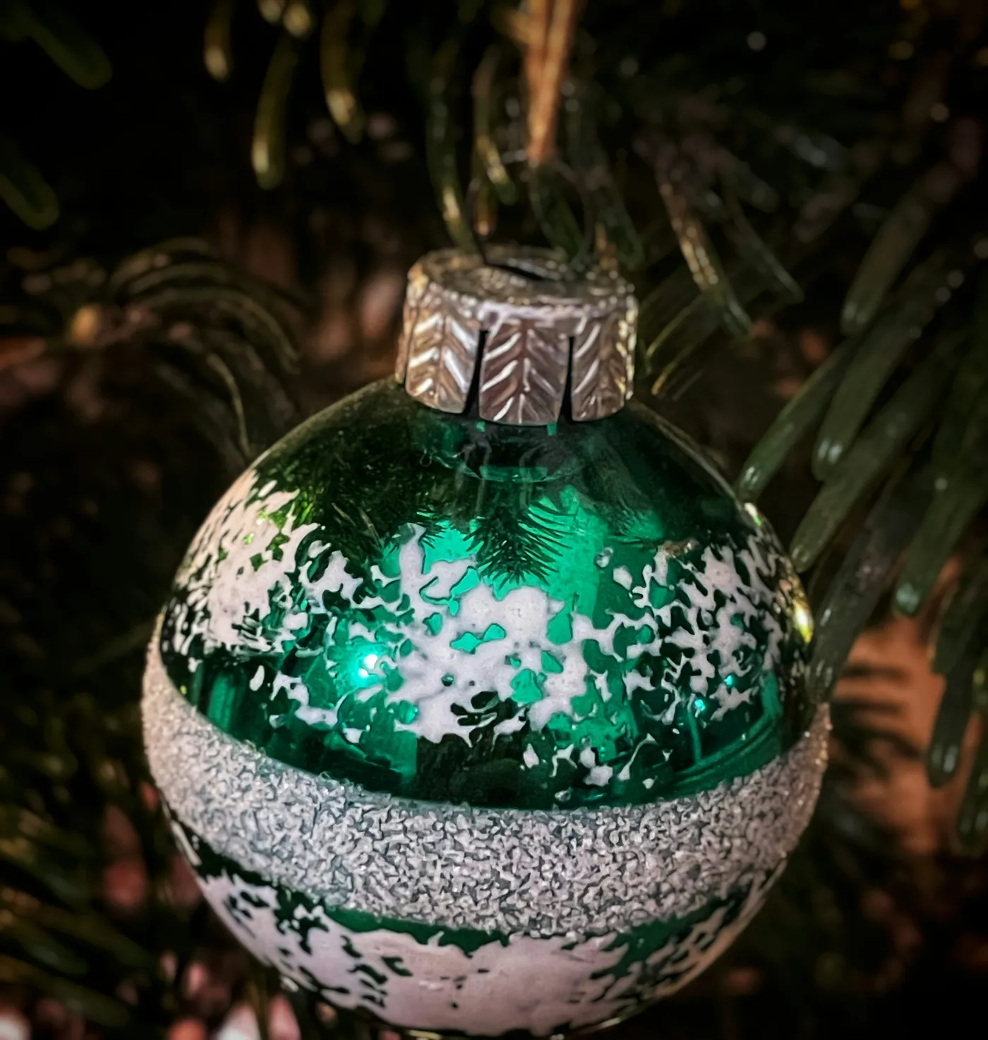 A green and white ornament hanging from a christmas tree - Free Photo on Unsplash