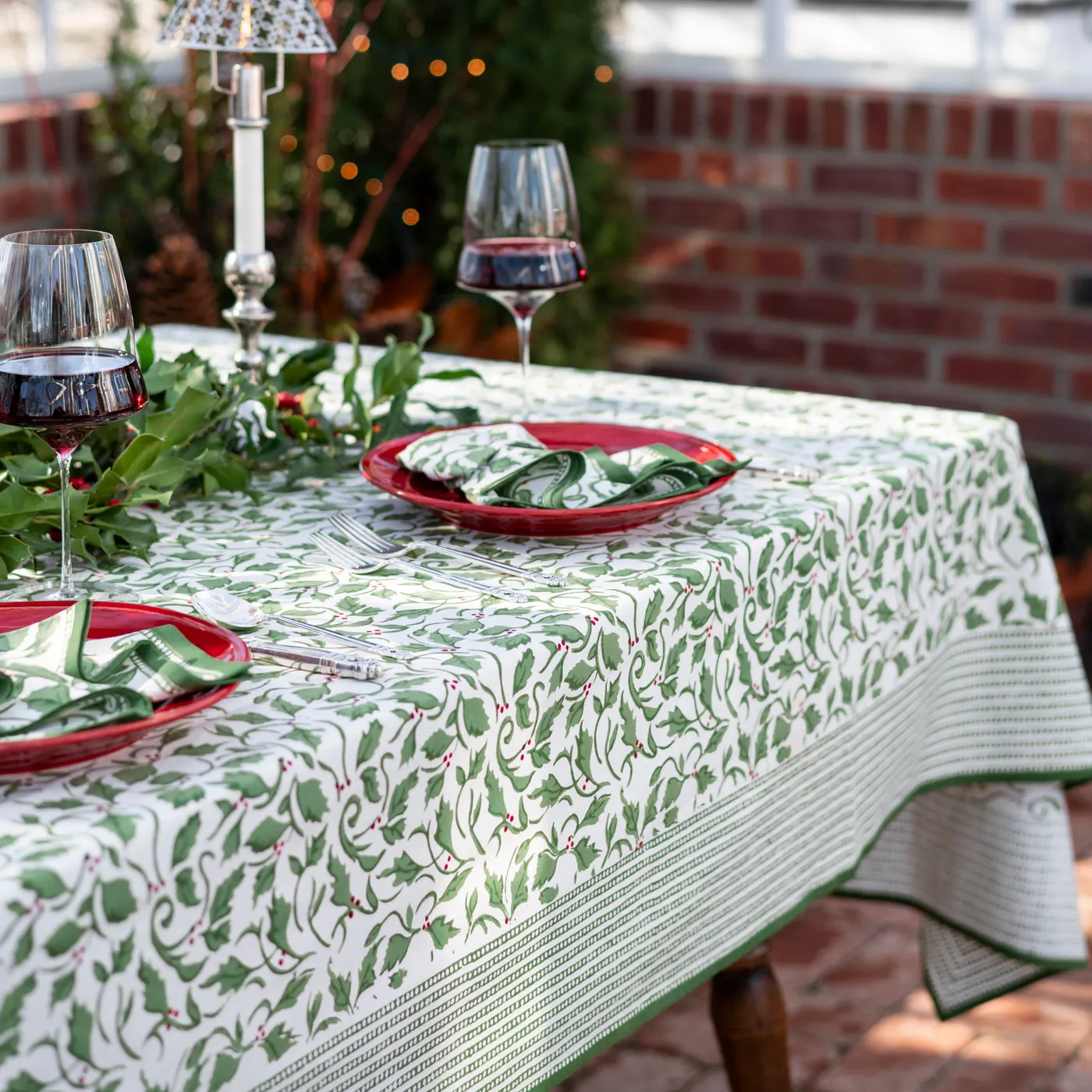 A Poinsettia and Holly Christmas Tablescape — Whispers of the Heart Longaberger Christmas Holly tablecloth double sided