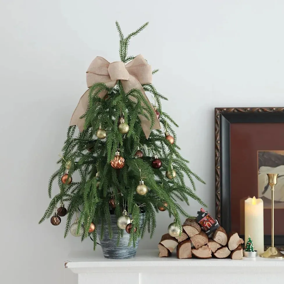 Amazon's $15 Pre-Lit Tabletop Christmas Tree Is a Hassle-Free Alternative  to Classic Large Firs