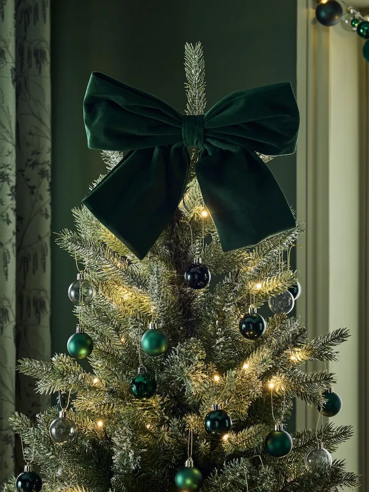Buy Green Velvet Christmas Bow Tree Topper from Next Ireland
