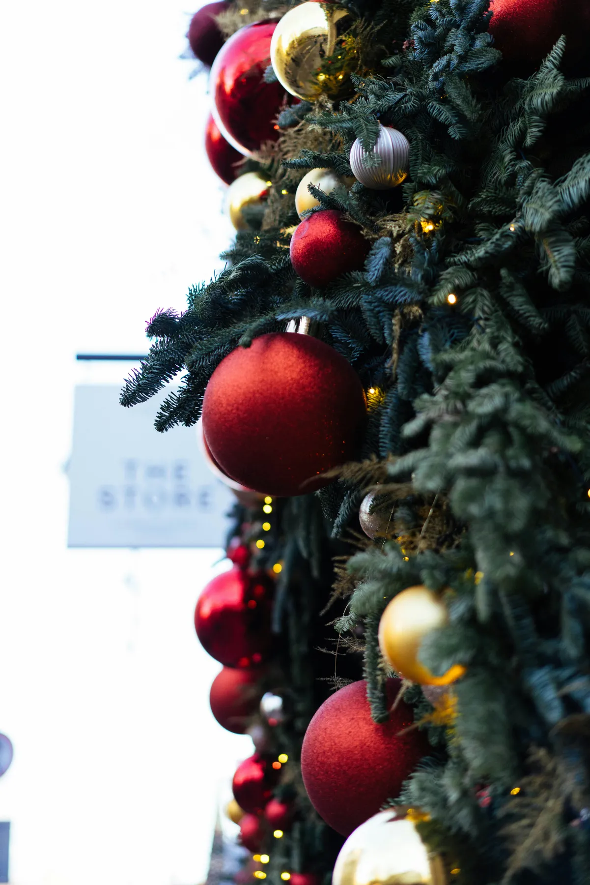 Christmas tree decorated with red and gold ornaments