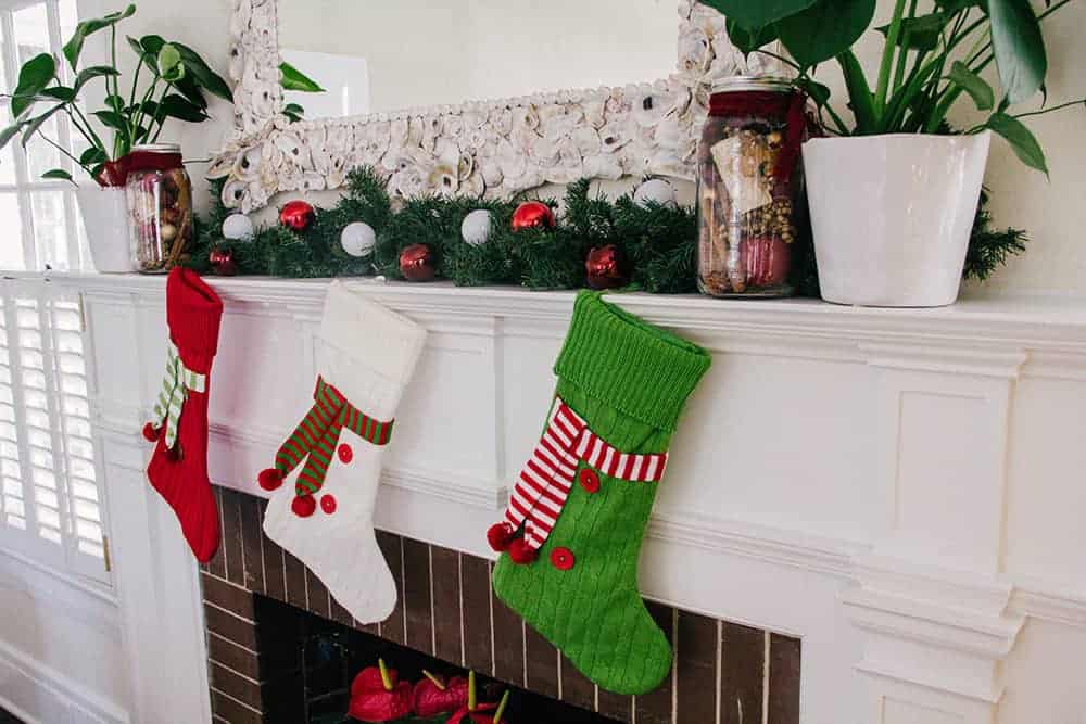 Creating an Elegant and Festive Christmas Fireplace Mantel - MHM Professional Staging