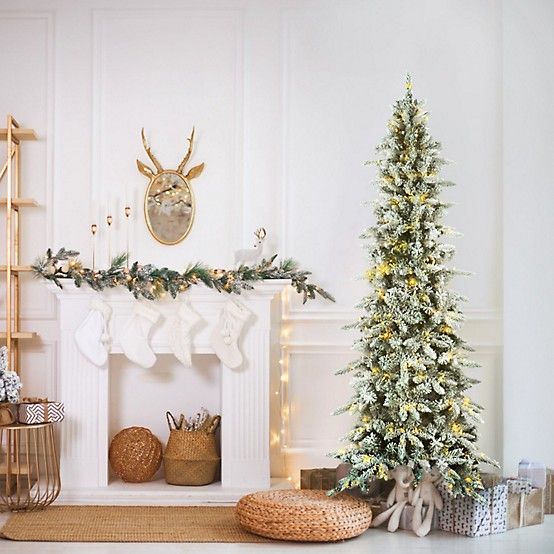 Fraser Hill Farm 9 ft. Pre-Lit Flocked Mountain Pine Slim Artificial  Christmas Tree, Warm White LED Lights at Tractor Supply Co
