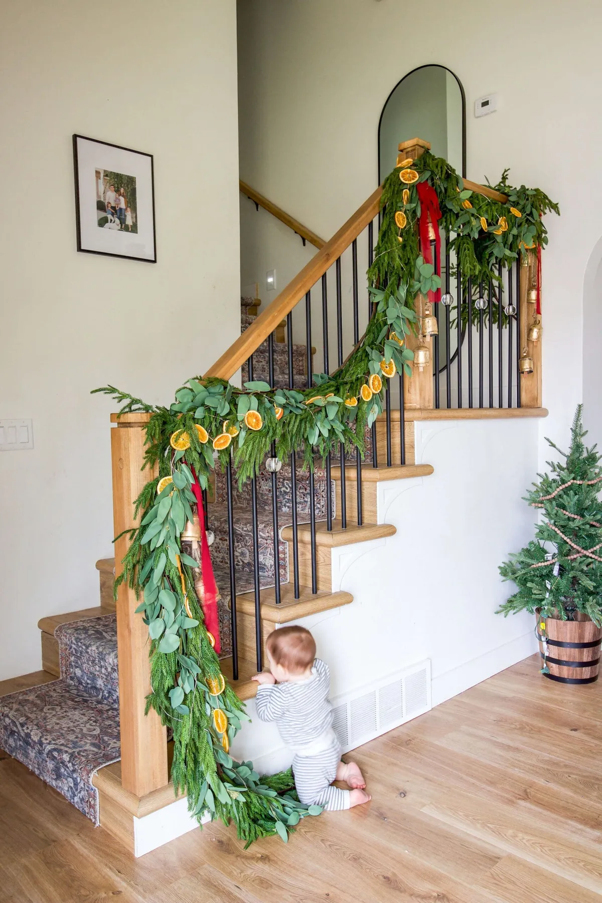 How to Decorate With Christmas Garland on a Staircase | Crystel Montenegro  Home