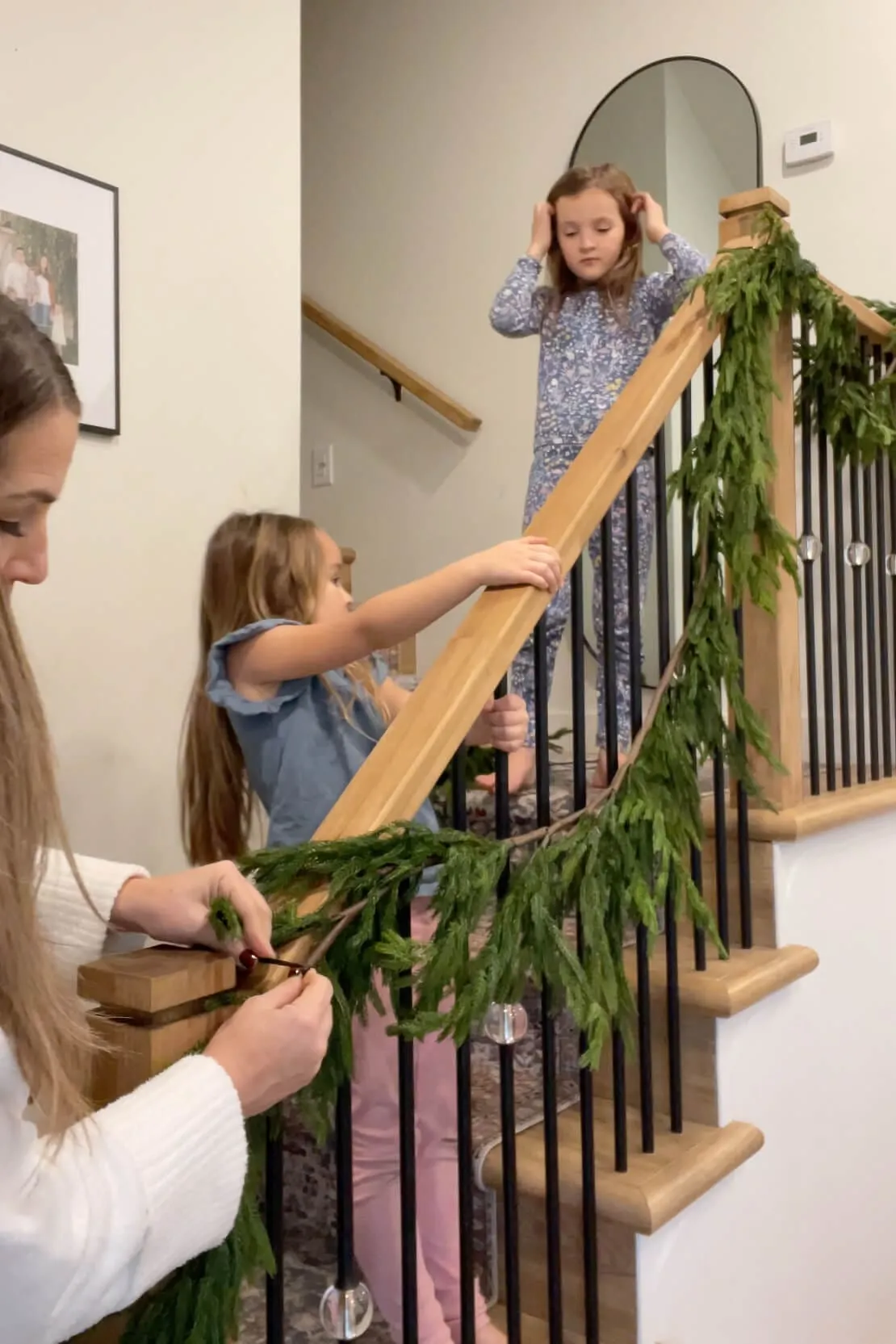 How to Decorate With Christmas Garland on a Staircase | Crystel Montenegro  Home