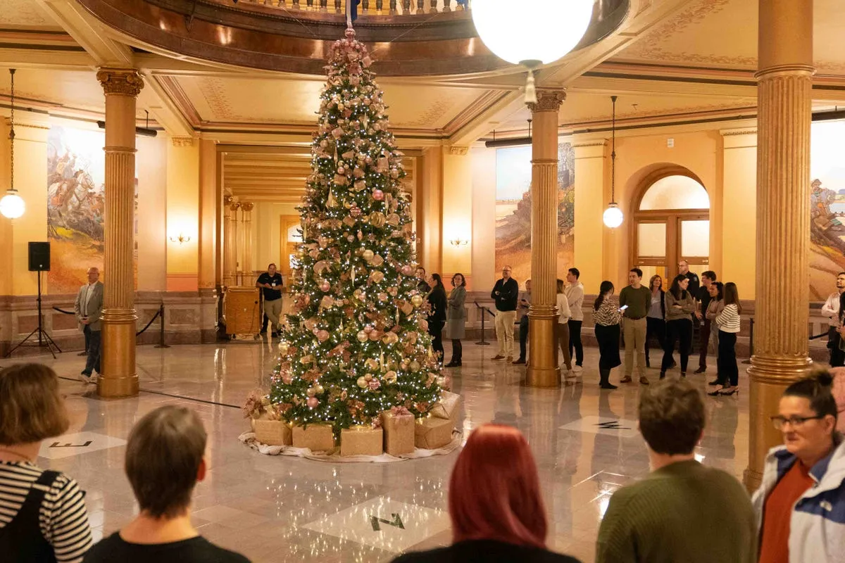 Laura Kelly lights 18-foot Christmas tree in Kansas Statehouse