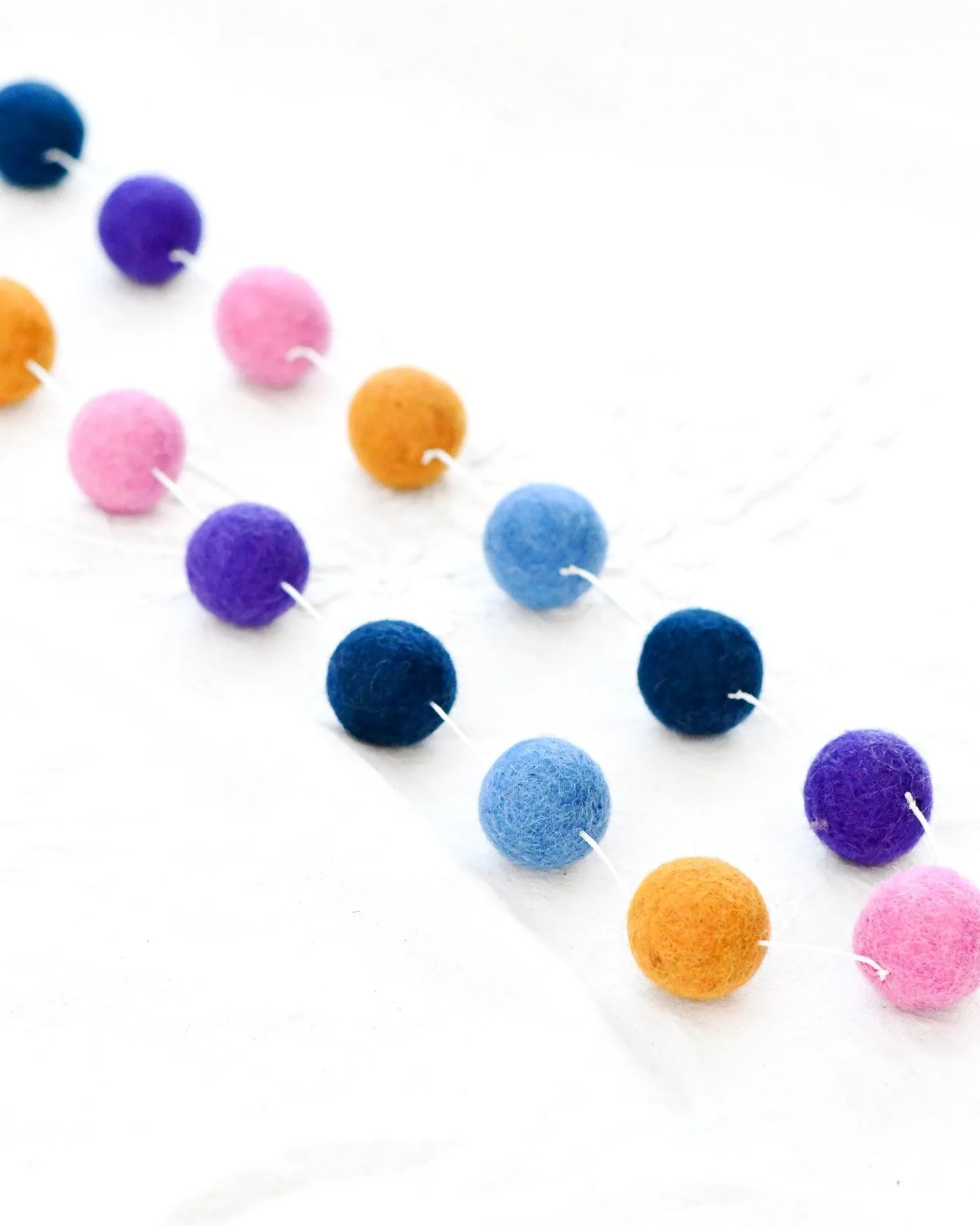 Pompom Felt Ball Garland - Confetti | Tara Treasures | Felt Play Food, Baby Cot Mobiles, Finger Puppets, Cat Caves, Kids Felt Toys
