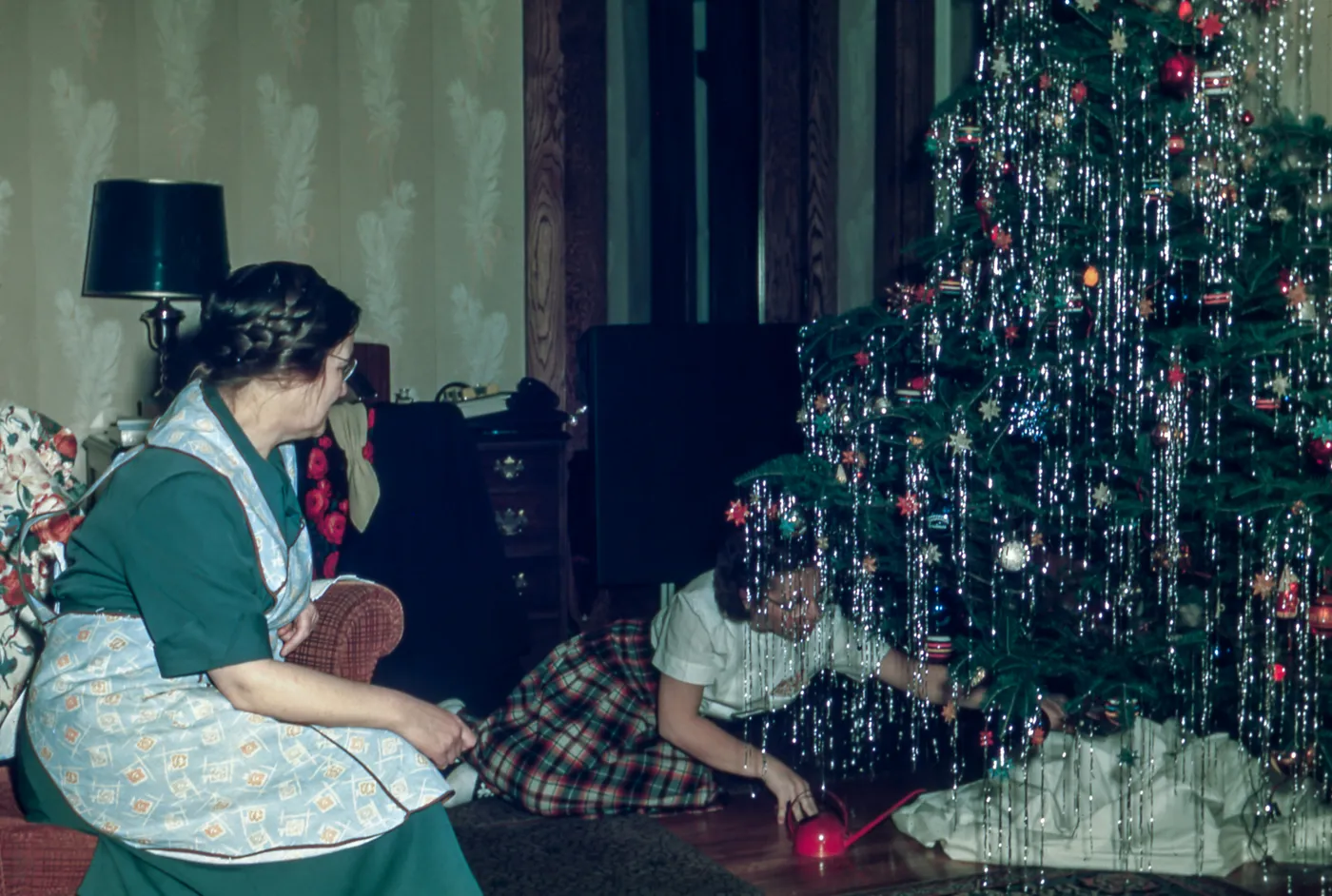 Putting gifts under the tree
